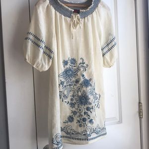 Delicate and feminine sheer embroidered tunic top